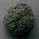 A manganese nodule collected in 1982 from the Pacific. Image: Wikimedia